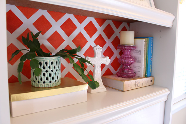 Bookshelf with Red Pattern Background