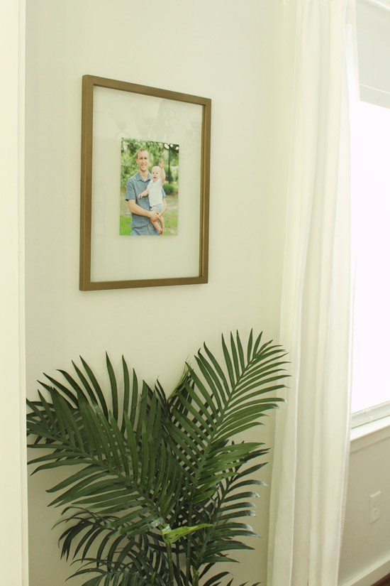 New Frames Hanging in Dining Room with Family Portraits