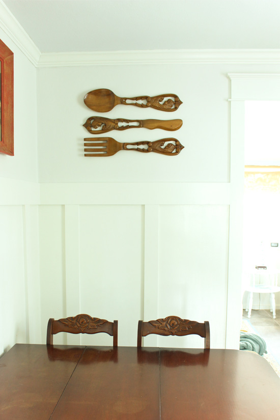 Wooden Decorative Utensils Hanging on Wall in Dining Room