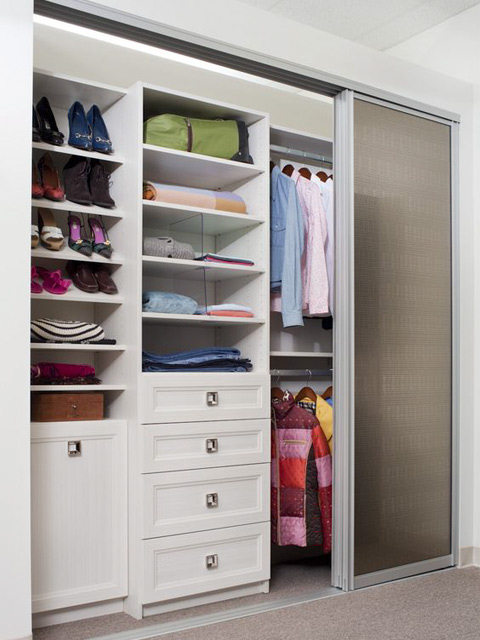 Closet with Frosted Glass Bypass Sliding Doors