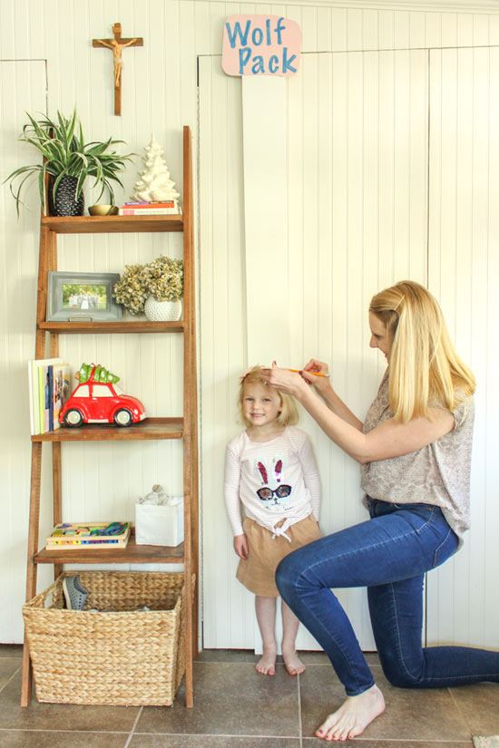 Marking Toddlers Height on Keepsake Chart