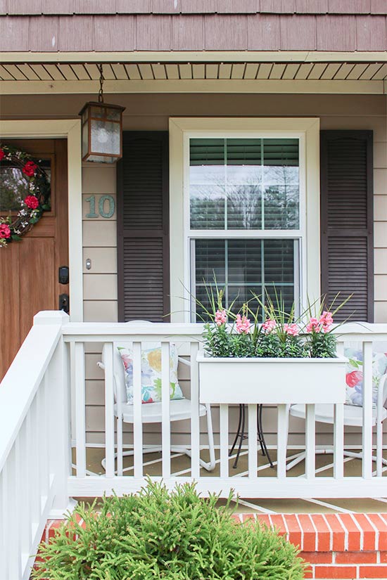 White Planter Box on White Porch Rails