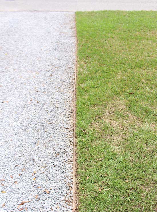 Gravel Driveway Next to Centipede Grass