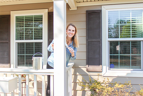 Updating Front Porch Columns with Fresh Paint