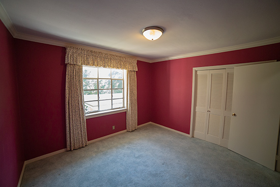 Dark Pink Child Bedroom with Bi-Fold Closet Doors