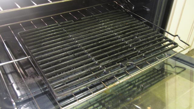 Grill grate sitting on self-cleaning oven rack