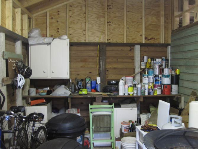 messy shed workshop without shelf