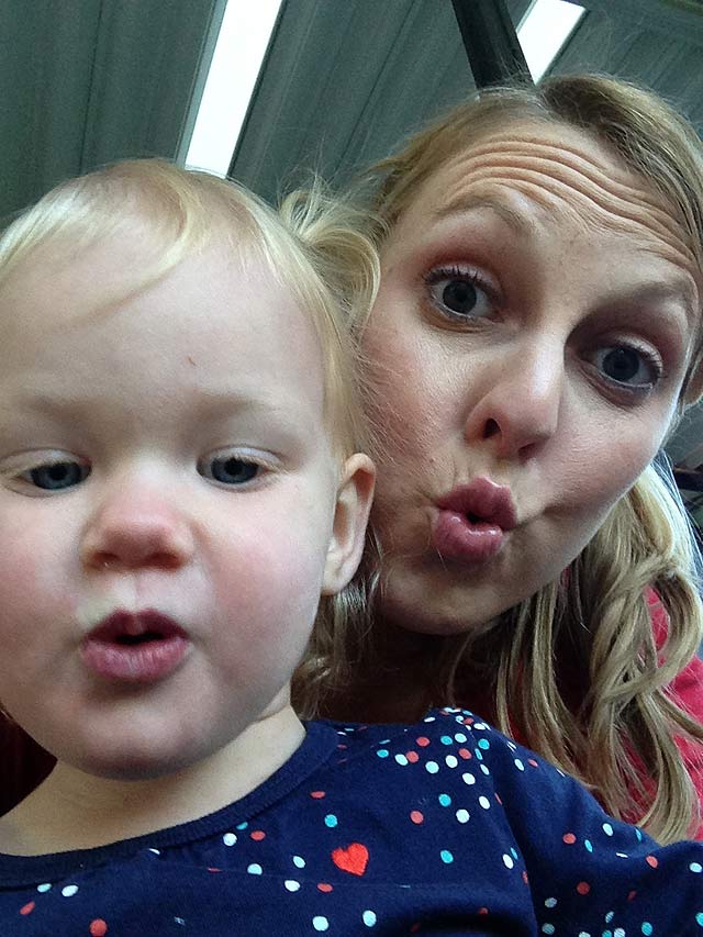 Chelsea Lipford Wolf making silly faces with toddler Ruby
