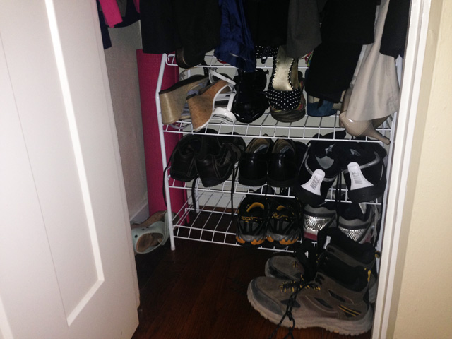 shoe rack with high heels and hiking boots
