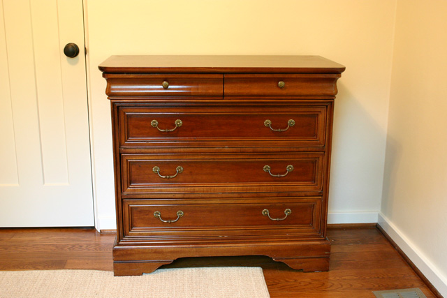 cherry wood stained dresser with brass drawer pull hardware