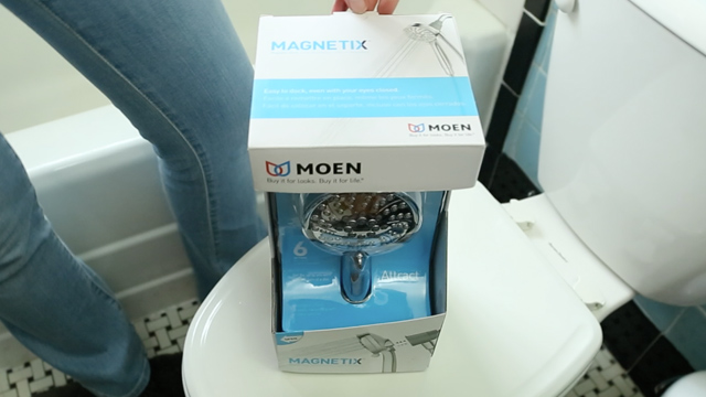 moen attract with magentix shower head in box in bathroom