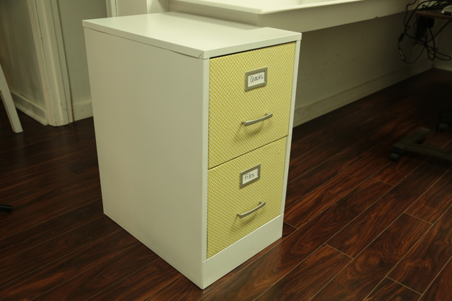 file cabinet with fabric on drawers and new drawer pulls