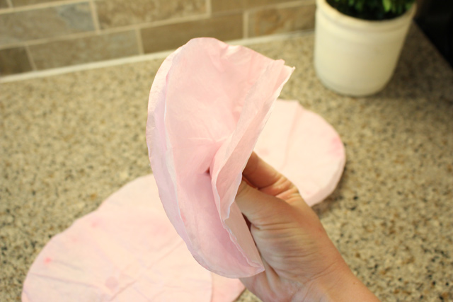 pink coffee filter folded in half