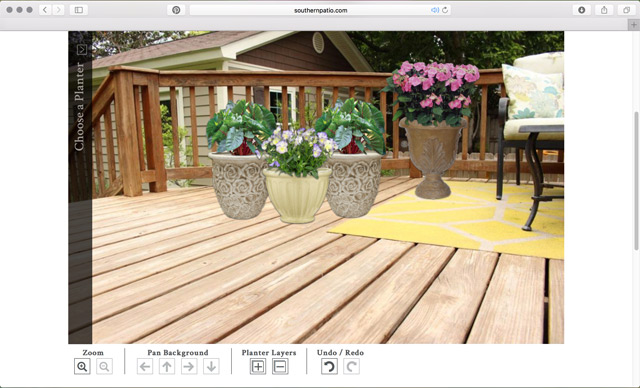 planters plants and flowers on stained wood deck