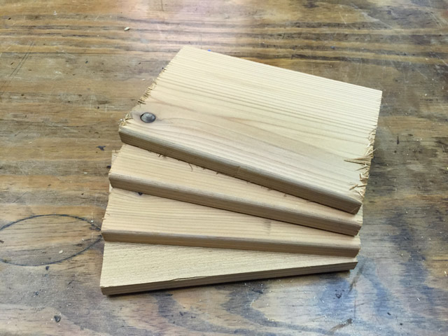 cedar planks sitting on workbench