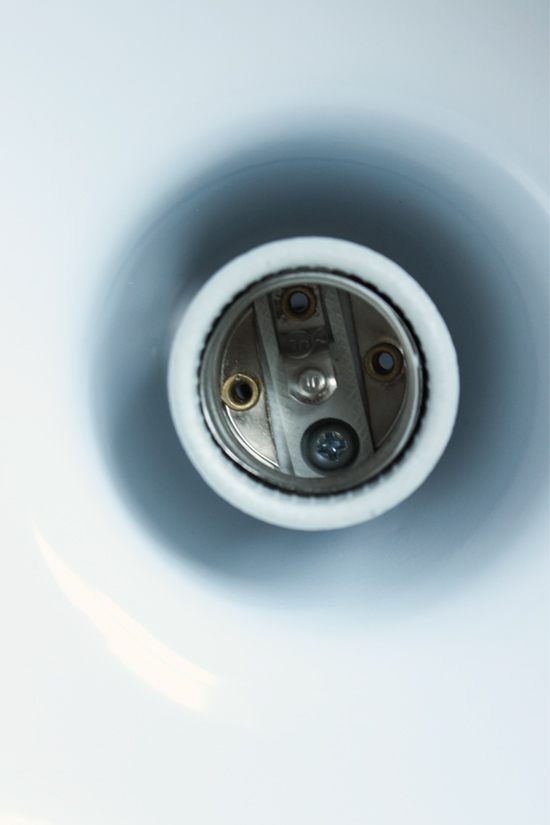 Screw Holding Bulb Socket in Place Before Removal