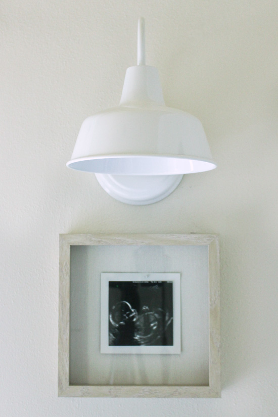 White Farmhouse Sconce Over Ultrasound Picture in Frame