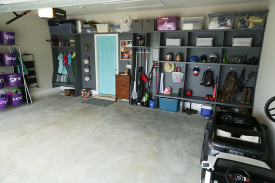 Gray lockers for storage in organized garage