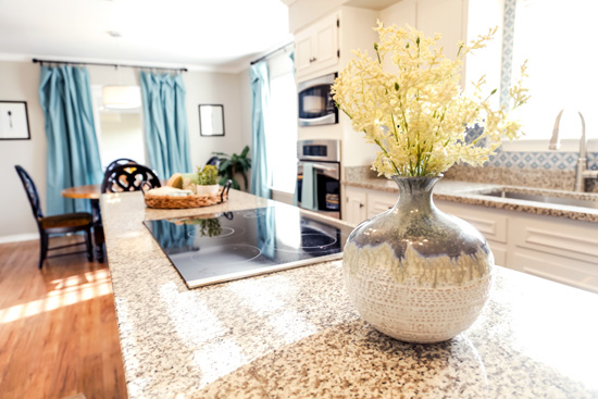 New Granite Countertops in Kitchen Updated on a Budget Featured on Today's Homeowner
