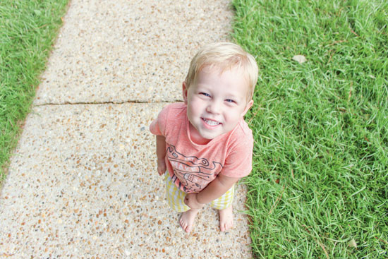 Gus Little Boy Smiling Concrete Front Walkway