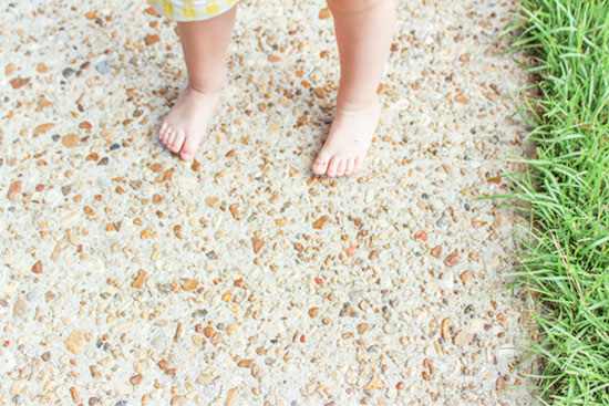 Toddler Boy Toes on Concrete Sidewalk