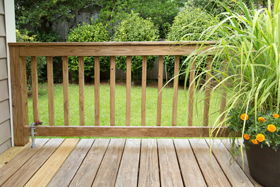 Refreshed Handrails on Wood Deck After Stripping Stain