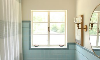 Frosted Windows in Blue Tiled Bathroom