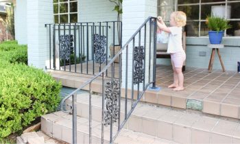 Baby Toddler Helping Paint Iron Handrails on 1950s Ranch Home