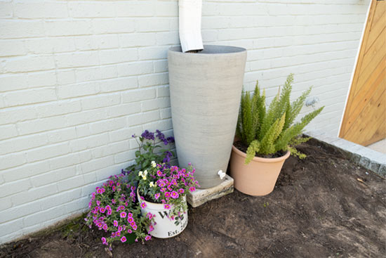 Faux Concrete Planter Used as Rain Barrel to Recycle Water